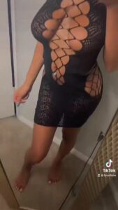 Busty Girl Wearing See Through Dress In The Mirror Tiktok Video